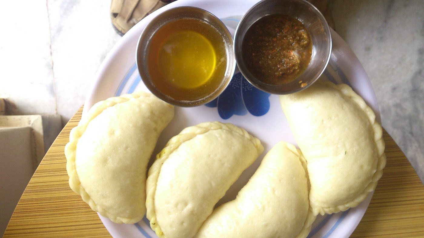 Siddu with ghee and green chutney